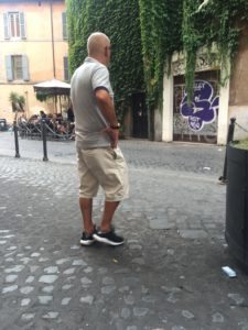 Guy wearing shorts in Florence Italy