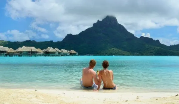 honeymooners on beach in Bora Bora