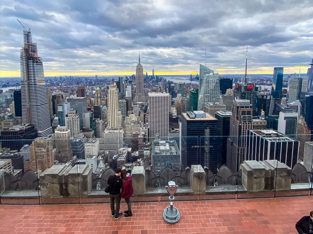 couple on top of Rockefeller Building
