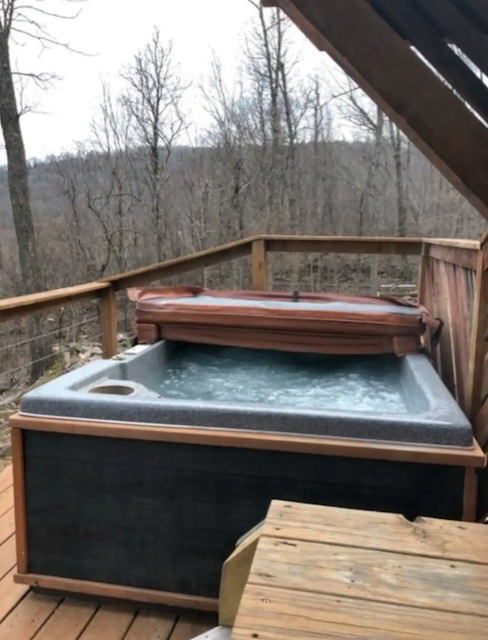 Cabin hot tub on porch