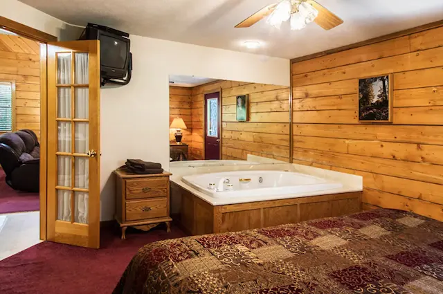 Jacuzzi tub in cabin bedroom