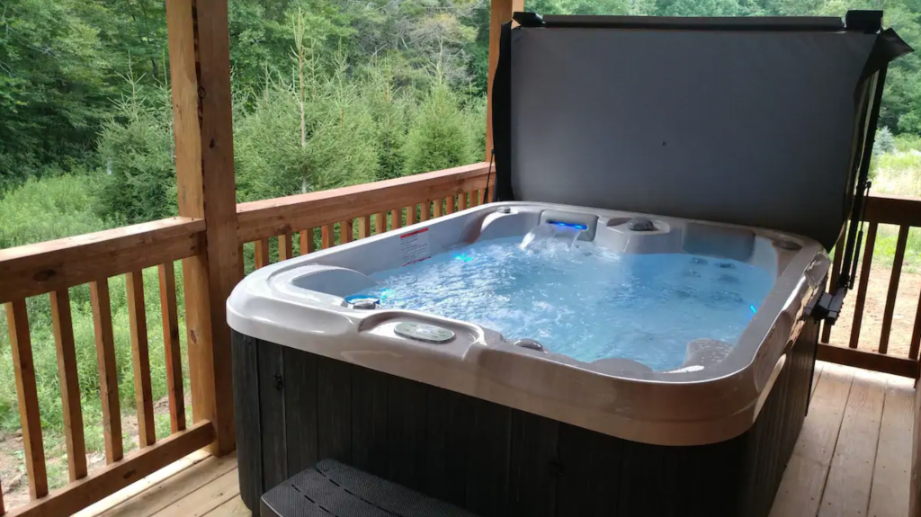 hot tub at Country Bumpkin Cabin 30 Minutes From Boone
