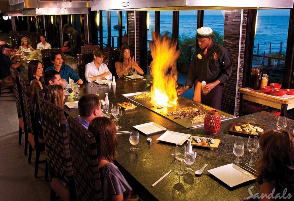 Open flame cooking at an asian dining experience at Ochi Sandals Resort