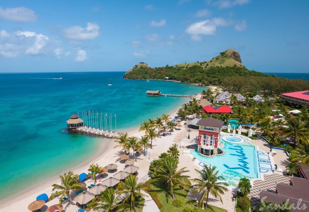 View of beach and pool at Sandals Grande St. Lucian resort.