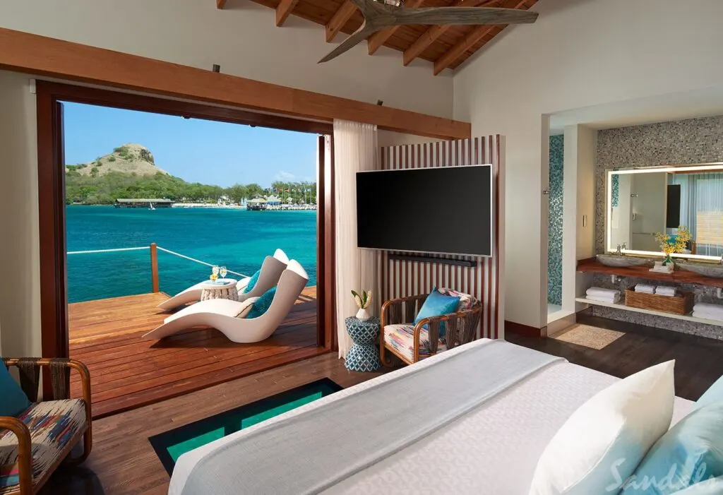 Inside view of an over-the-water bungalow at a Sandals resort
