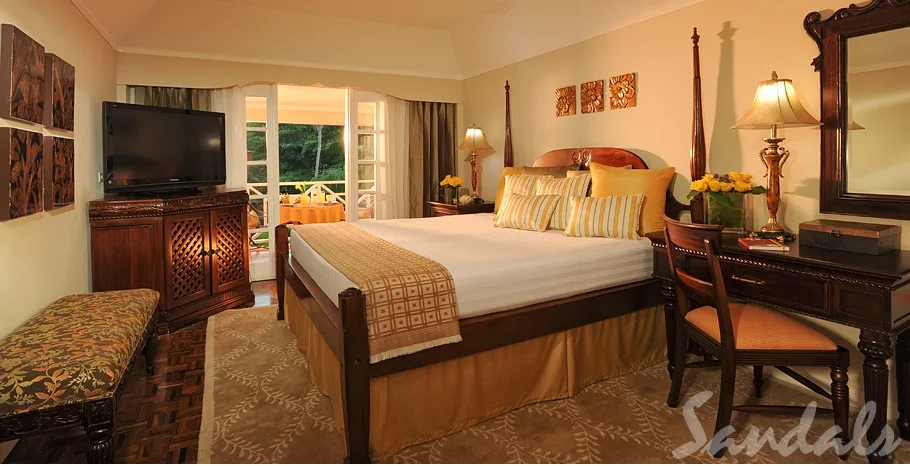 Most affordable Sandals Resort - Sandals Ochi Beach Resort - bedroom view with a balcony.